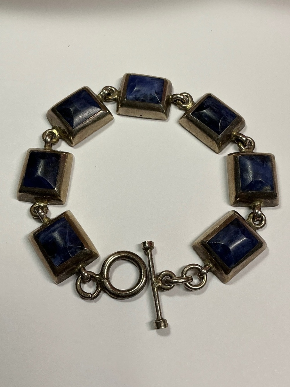 Sterling Silver Bracelet with Blue Stones. 7.75 inches long